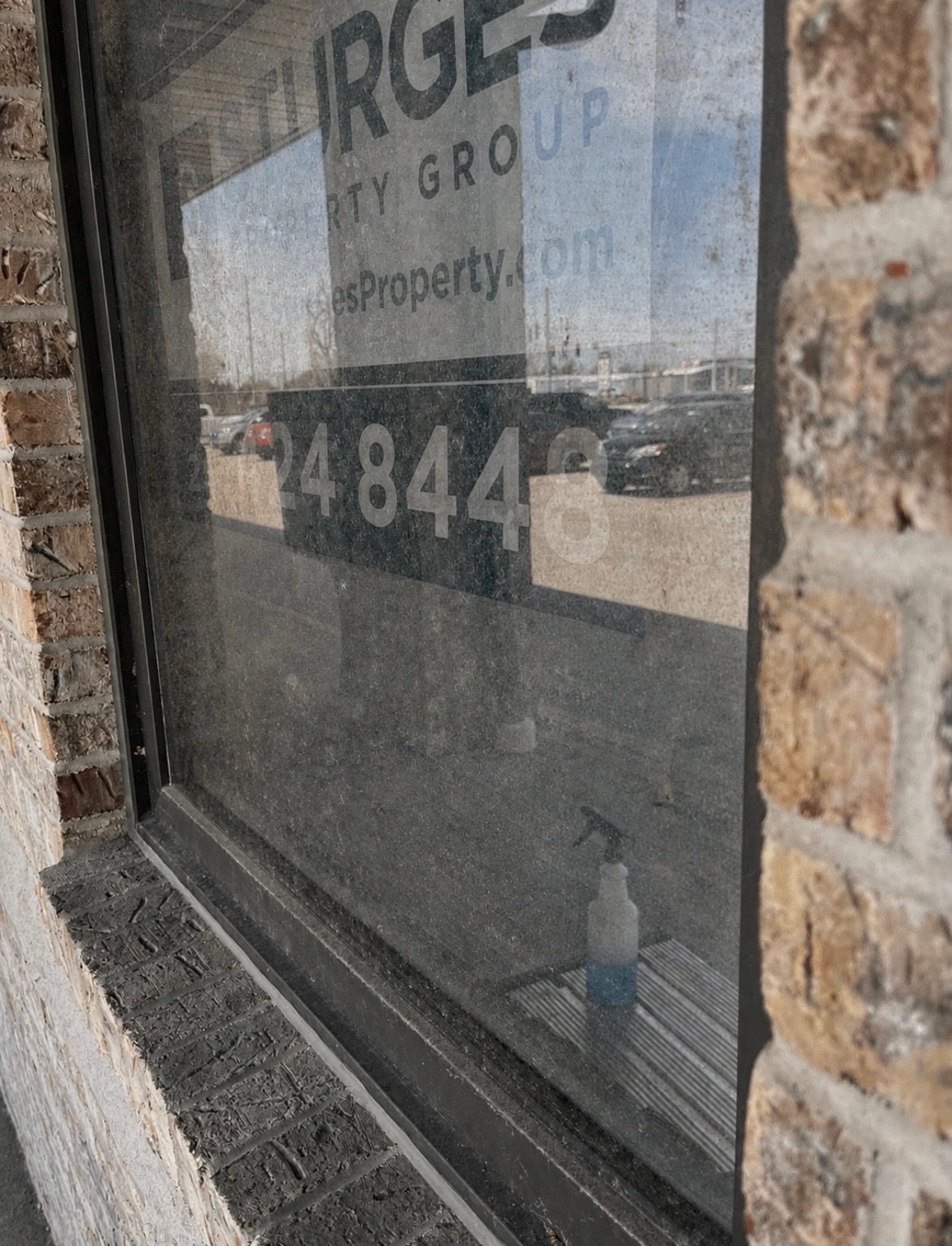 Commercial storefront — Before window cleaning by Window Shine