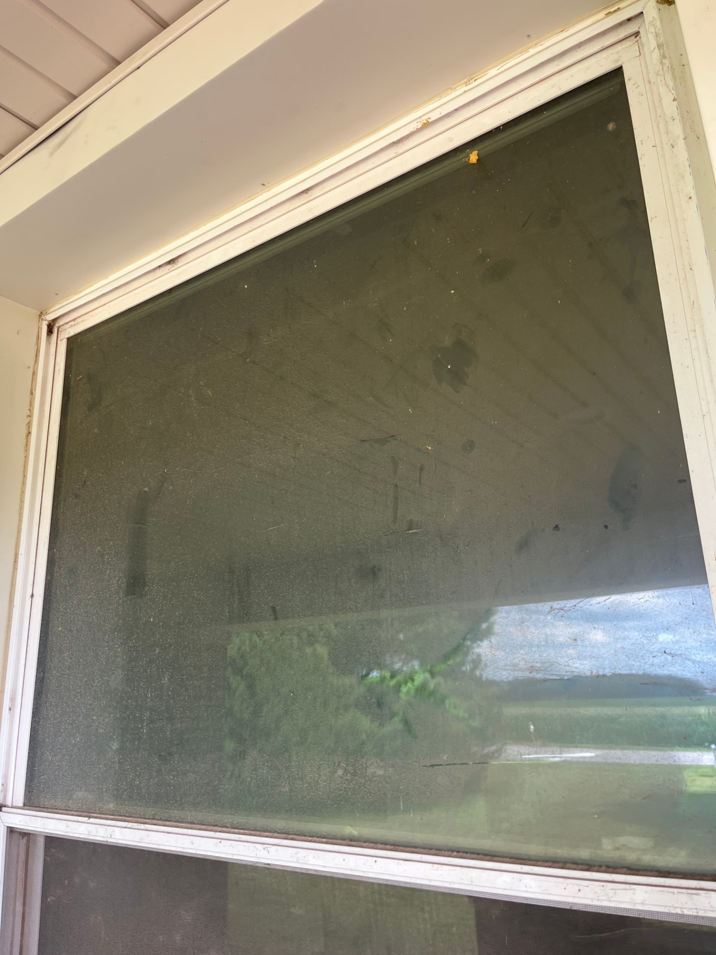 Porch picture window — Before window cleaning by Window Shine